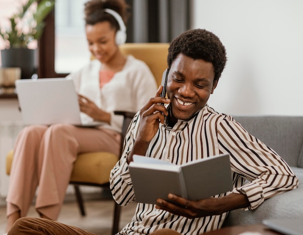 Woman and man remote working from home