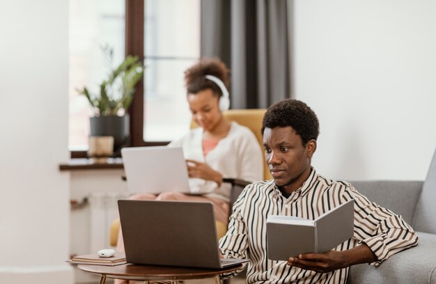 Woman and man remote working from home