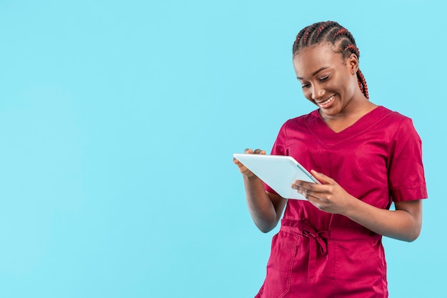 woman medic using a digital tablet