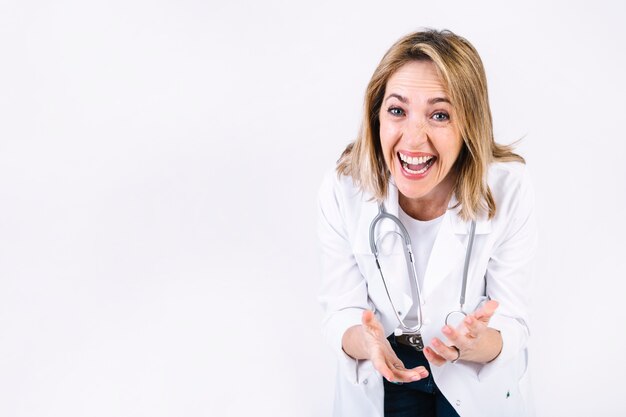 Woman in medical overall laughing