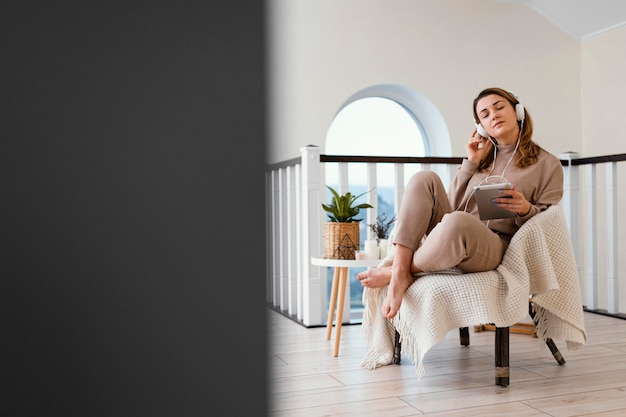 Free photo woman meditating indoor