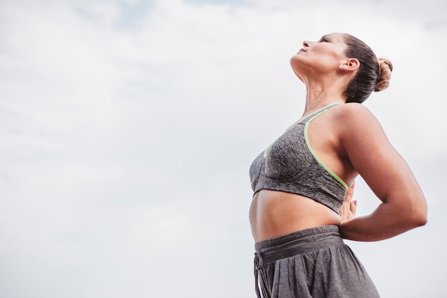 Woman meditating looking to sky