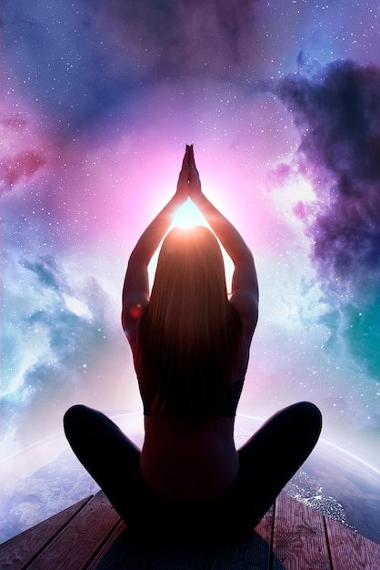 Woman meditating with abstract background full shot