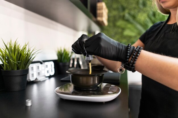 Woman mixing hair dye in a bowl