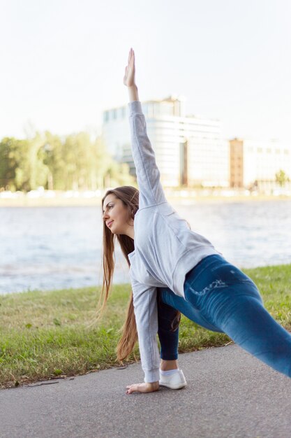 Woman open legs and raised arm