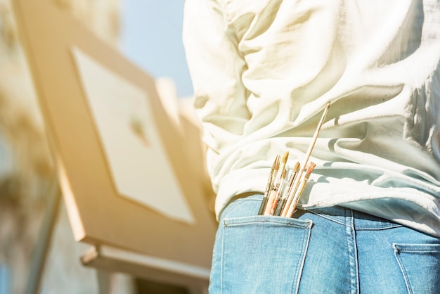 woman painting outdoors
