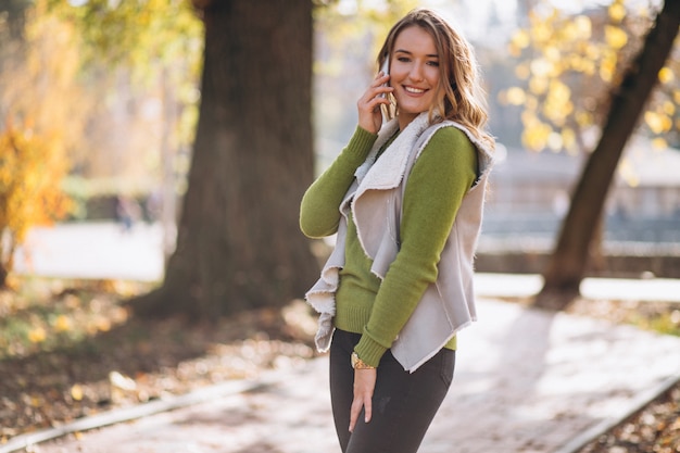 Woman in park talking on the phone