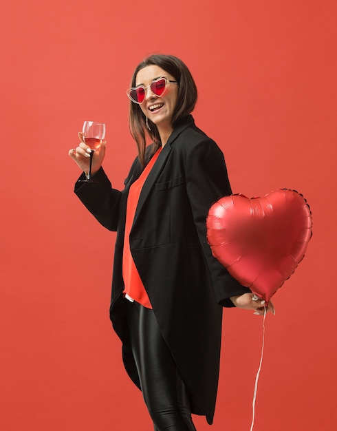 Free photo woman at party drinking wine