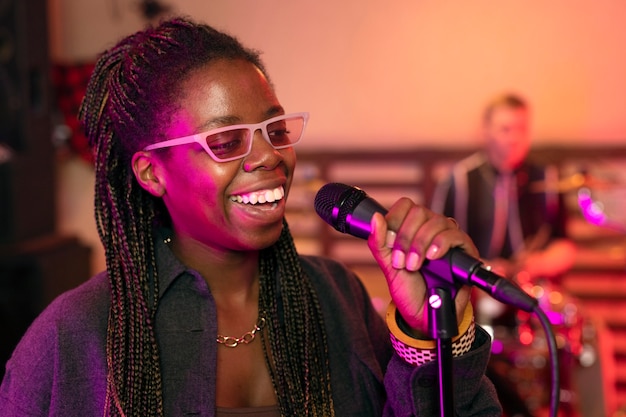 Woman performing live music at a local event