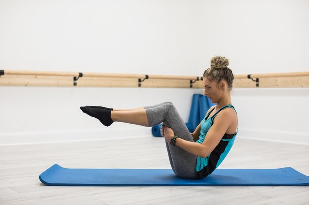 Woman performing stretching exercise