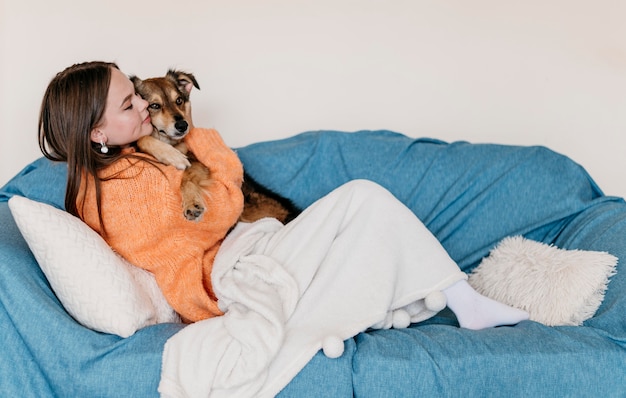 Woman petting adorable dog