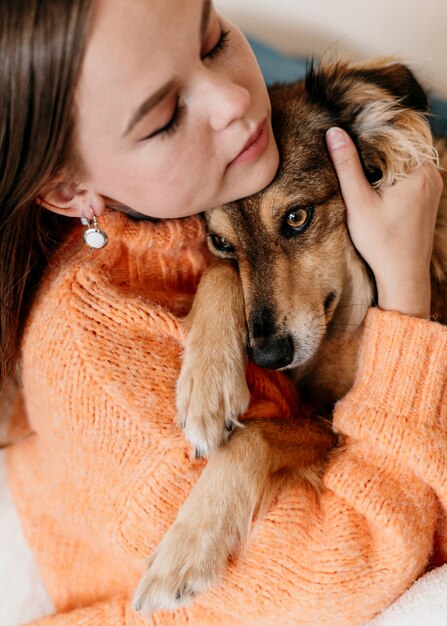 Woman petting adorable dog