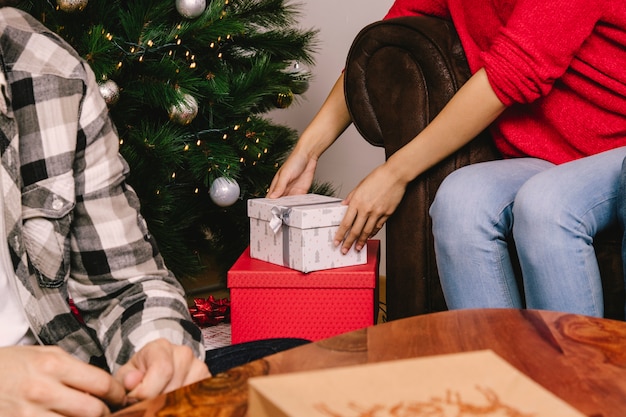 Woman picking up present