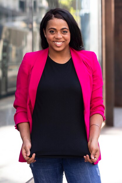 Woman in pink suit stylish business casual look outdoor photoshoot