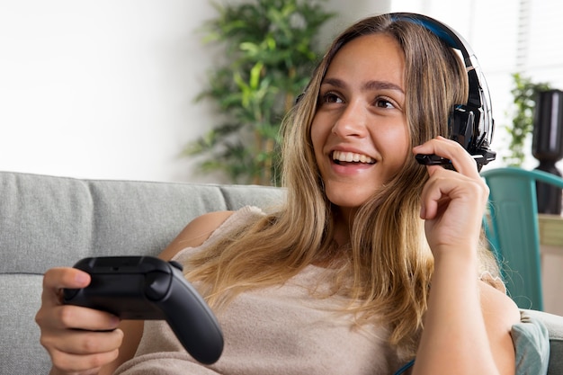 Free: Portrait of an excited pretty girl playing games Free Photo 