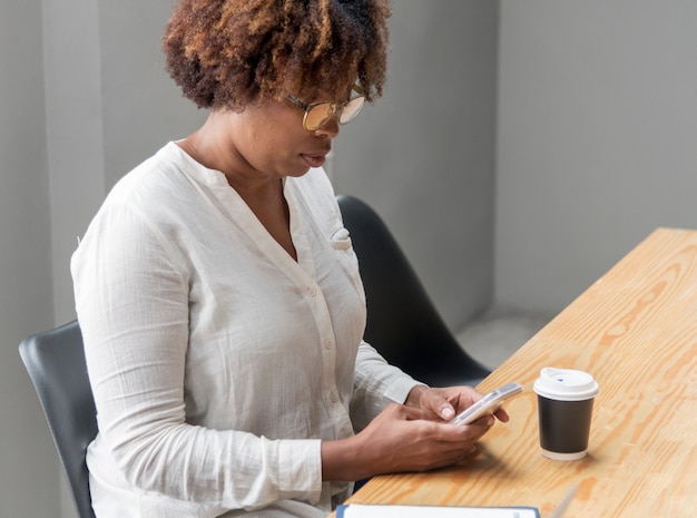 Woman playing on her phone