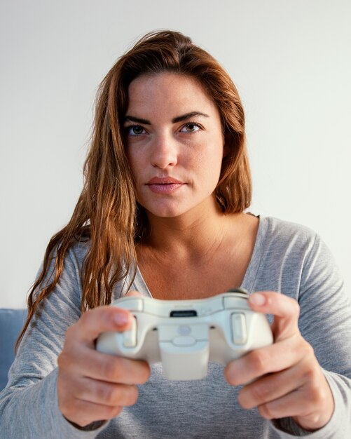 Woman playing on joystick