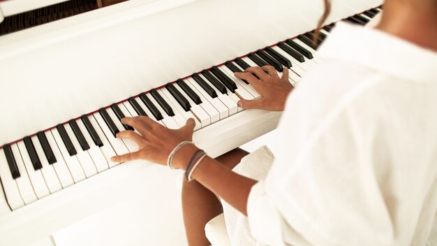 woman playing the piano