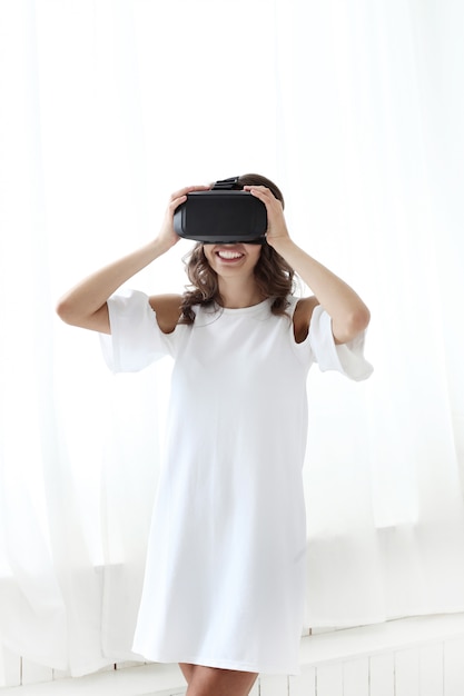 Woman playing to Virtual reality