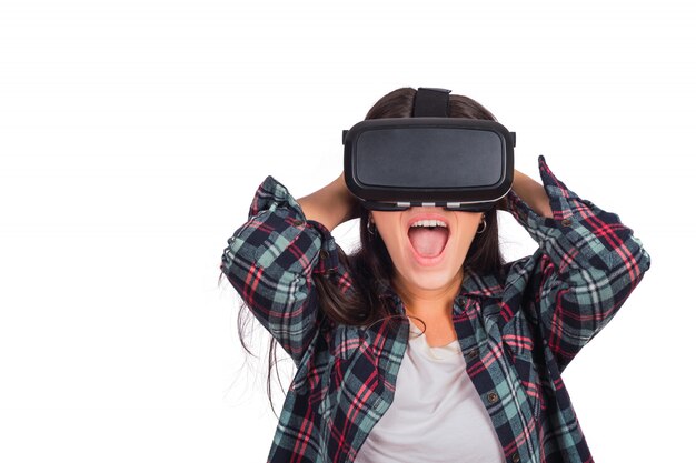 Woman playing with VR-headset glasses.