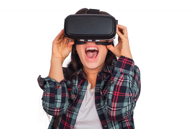 Free photo woman playing with vr-headset glasses.