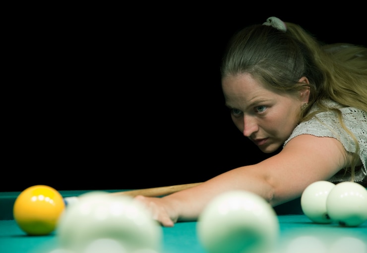Free Photo woman plays russian billiards