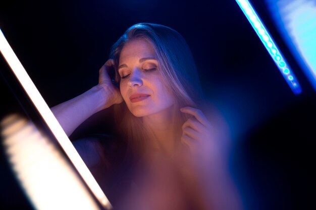 Woman portrait with blue lights visual effects