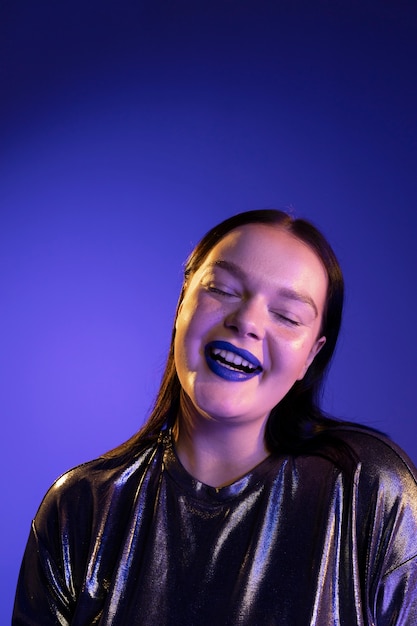 Woman portrait with bright blue lips