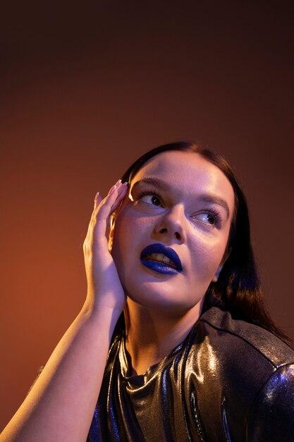 Woman portrait with bright blue lips