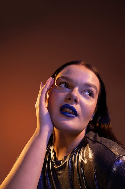 Woman portrait with bright blue lips