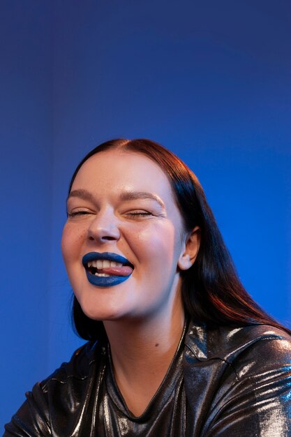 Woman portrait with bright blue lips