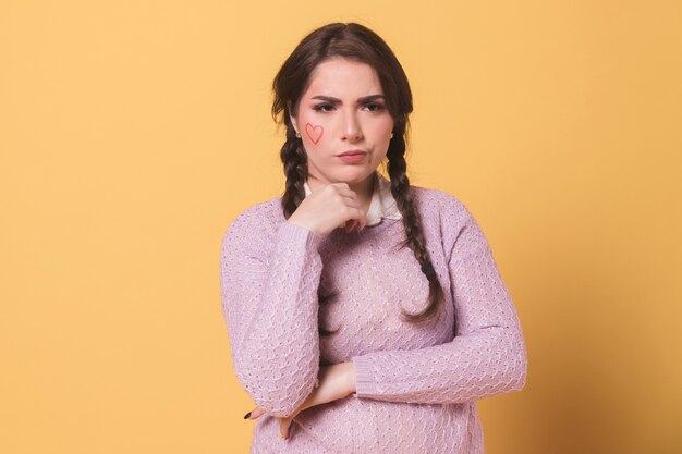 Woman posing as if she's not believing what she's hearing