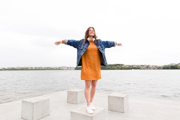 Woman posing at seaside view