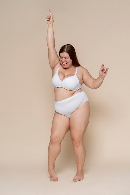 Woman posing in underwear full shot