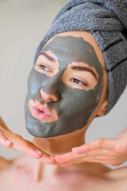 Woman posing while wearing face mask