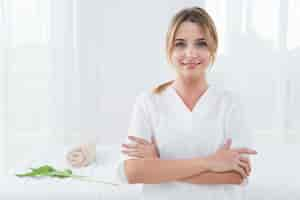 Free photo woman posing with bathrobe in a spa