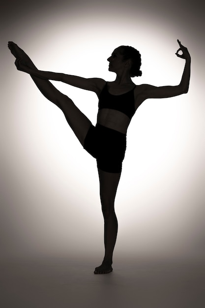 Woman posing with bright light full shot