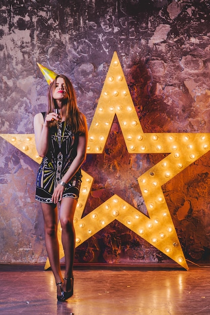 Free photo woman posing with champagne