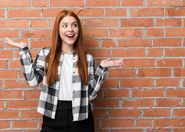 Woman posing with hands up