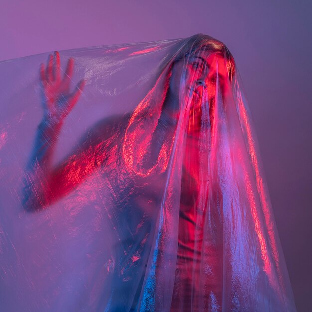 Woman posing with plastic foil