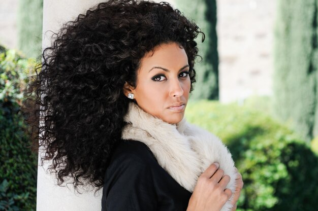 Woman posing with a scarf