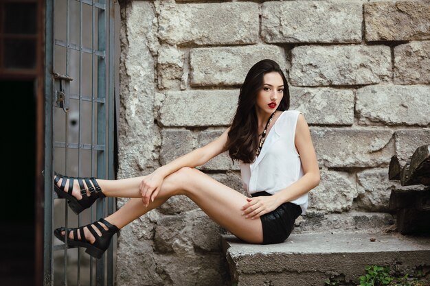 Woman posing with stretched legs