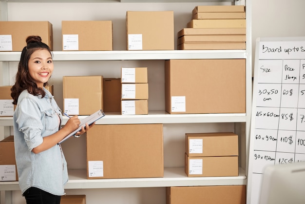 Woman in post warehouse