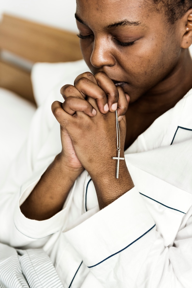 Free Photo a woman praying