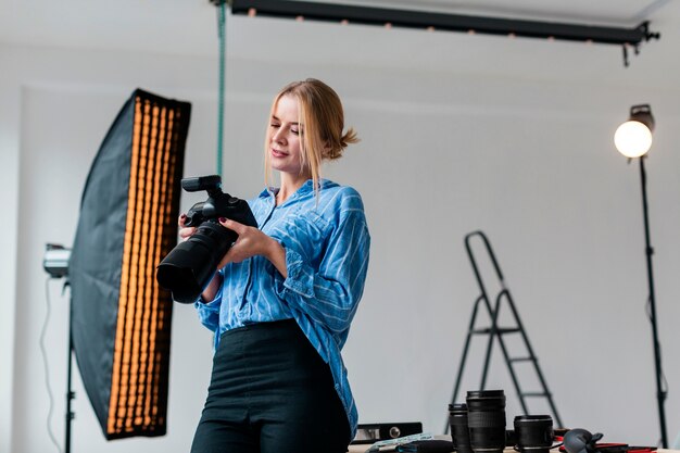 Woman preparing the studio for a shooting