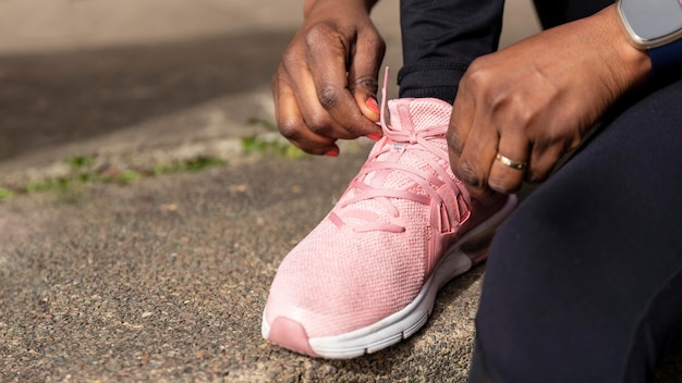 Woman preparing for a training in sportswear