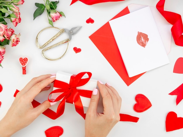 Free photo woman preparing valentine gift