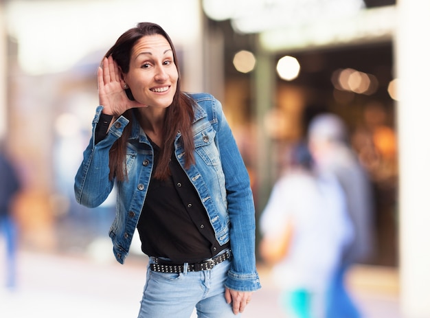 Woman pretending not to listen