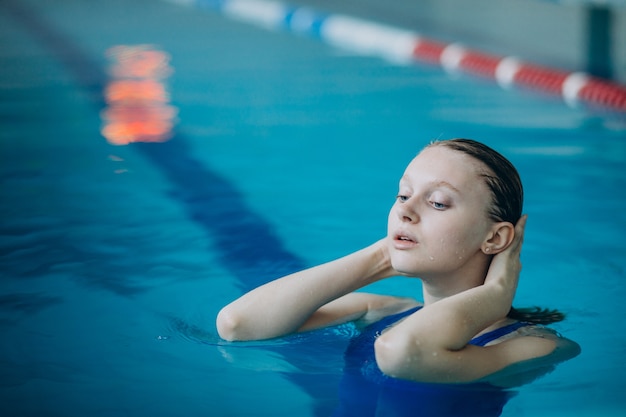 Woman professional swimmer in swimming pool