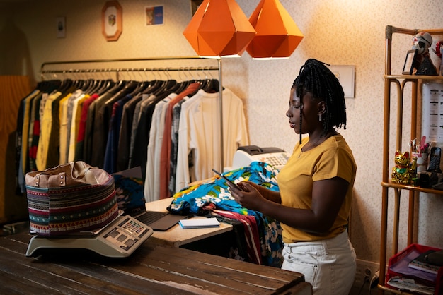 Woman promoting cloths from thrift store